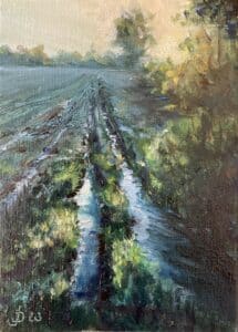 Ölgemälde eines Feldwegs mit Pfützen im Morgenlicht, von Matthias Schneider-Dominco, 2023.